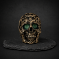 Verzierter Totenkopf – schwarz-gold